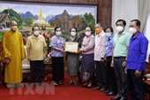 Chư tăng ni, Phật tử Việt Nam tại Lào cùng dân sở tại chống dịch